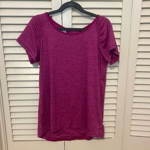 short sleeved pink athletic shirt